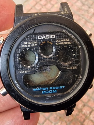 Casio G-Shock watch case with back cover and buttons used