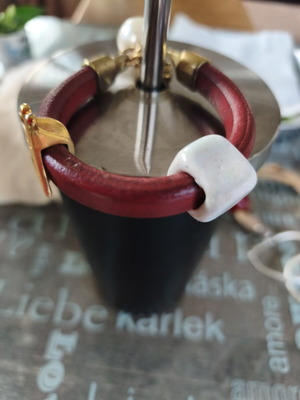 Handmade leather bracelet used with simple bead in burgundy red and brown