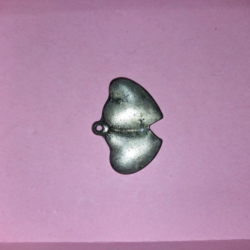 Metal heart-shaped pendant like new