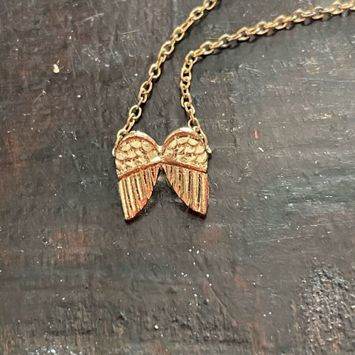 Necklace new, gold color, faux bijou with feathers