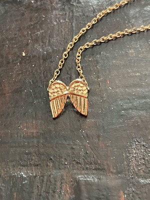 Necklace new, gold color, faux bijou with feathers