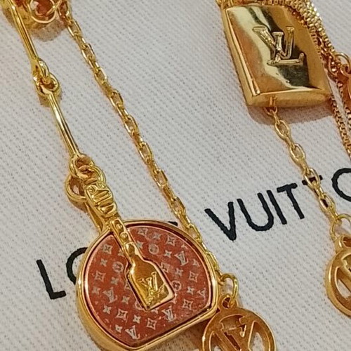 Louis Vuitton stainless steel earrings, rare sold out design, gold tone