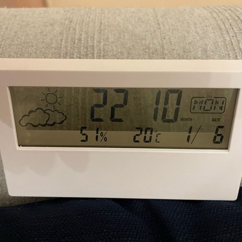 Clock with date and temperature display like new