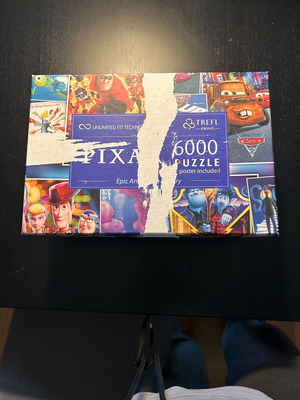 Pixar puzzle 6000 pieces used with one of four bags opened