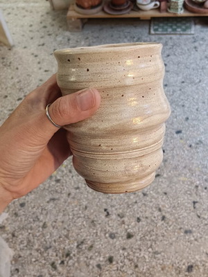Handmade ceramic mug with terracotta clay and beige color, like new