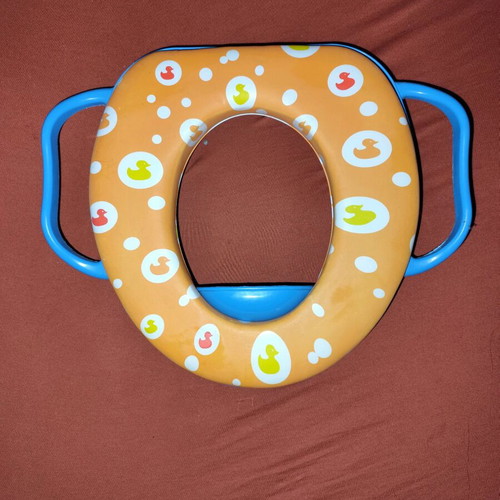 Children's toilet seat used with soft cushion and duck decoration