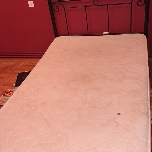 Metal single bed with mattress, black frame
