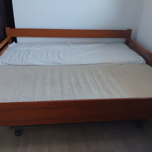 Wooden sofa bed like new with 2 mattresses and metal mechanism