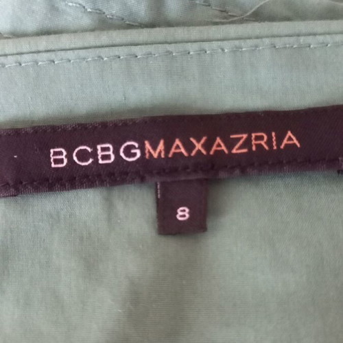 BCBG Maxazria green dress with pockets, backless, size M