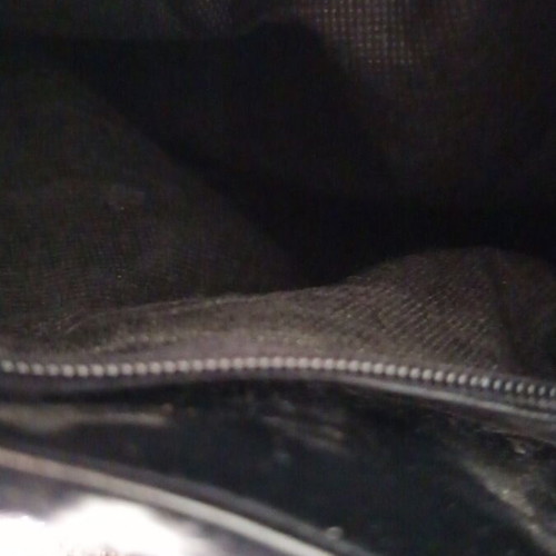 Shoulder bag with animal print giraffe design like new, black and white