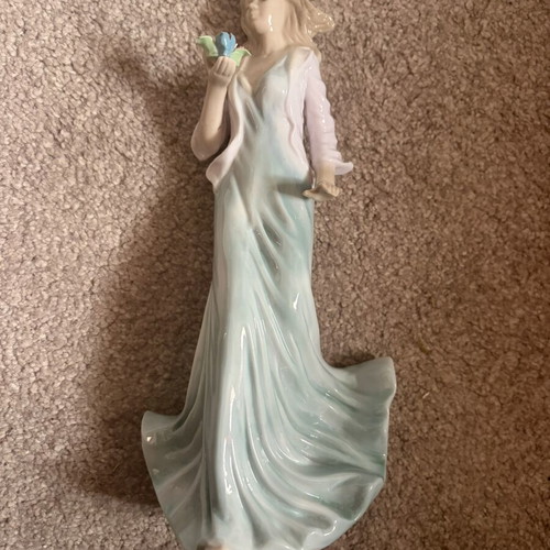 Porcelain figurine doll like new, height 25 cm
