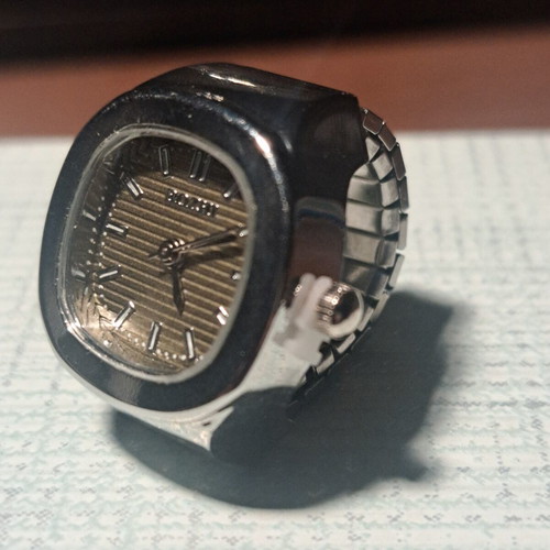Ring watch with khaki dial and silver bracelet like new