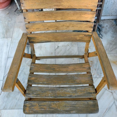 Wooden outdoor chairs used, set of 5, one with broken plank