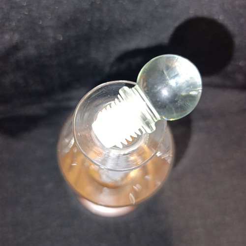 Vintage glass decanter with ship inside, used