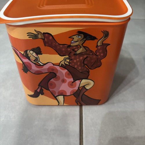Tupperware canister with figures