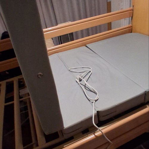 Electric hospital bed like new with mattress, wheels, and patient lifter