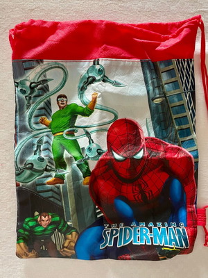 Spiderman rubber keychain and drawstring pouch used