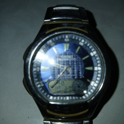 Casio Illuminator wristwatch used, blue and silver, solar battery