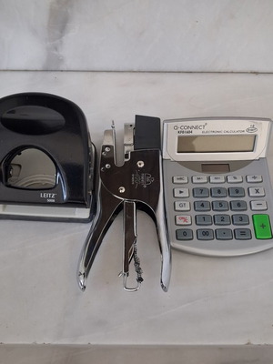 Office supplies set used with Leitz hole punch, Maestri stapler, Q-Connect calculator
