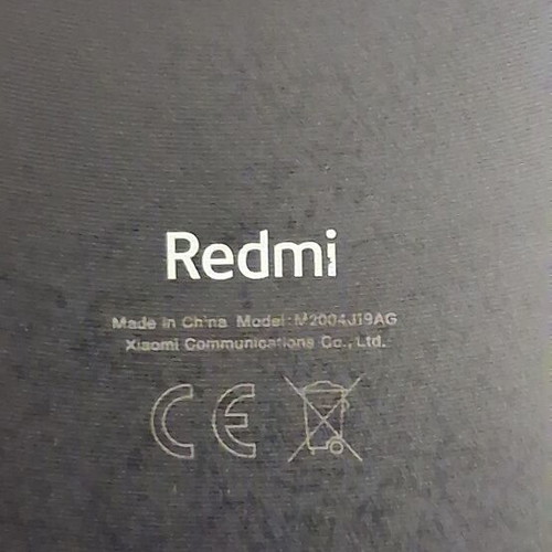 Xiaomi 9 smartphone with screen protector and case, gray