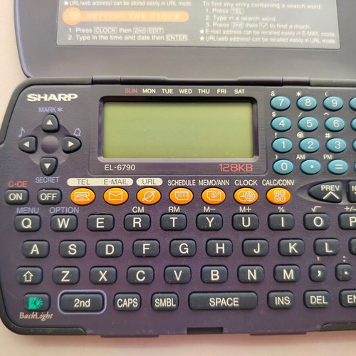 Sharp EL-6790 electronic organizer used, with external marks