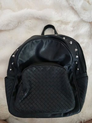 Backpack with studs like new, black