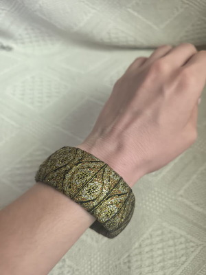 Bracelet used, black and gold