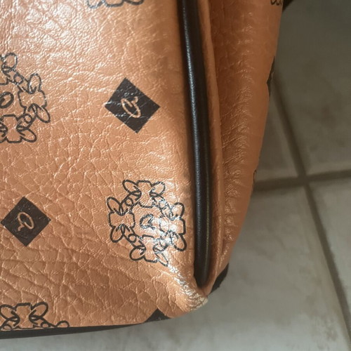 Axel backpack, brown with small imperfections