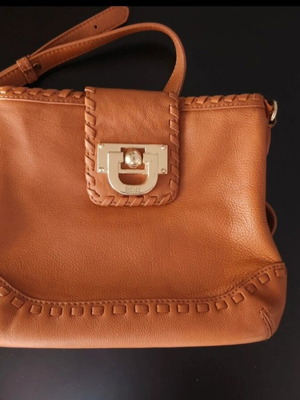 DKNY crossbody bag like new, tan color, adjustable strap