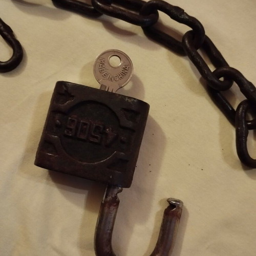 Padlock used with key, chain and skeleton key