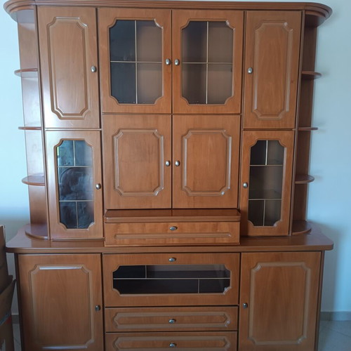 Furniture set like new including wardrobe, bed, table, drawers, sofa, and cabinet