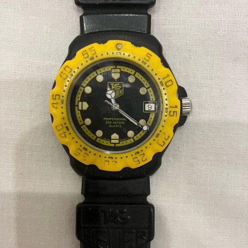 Tag Heuer F1 used watch in yellow and black with minor strap defect