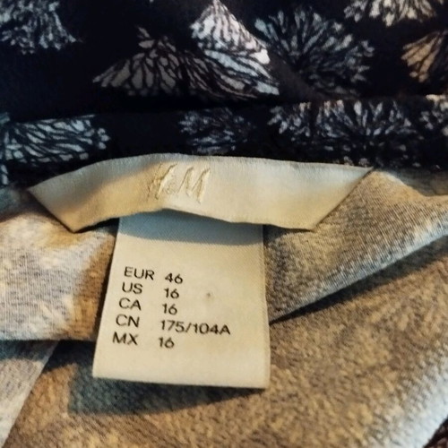 H&M floral dress with subtle back cut out like new