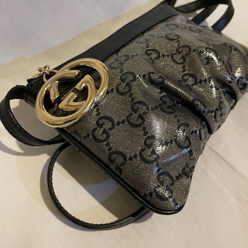 Gucci crossbody bag like new black and gray with gold glitter