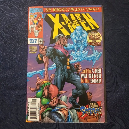 X-Men #69 like new with Carlos Pacheco signature