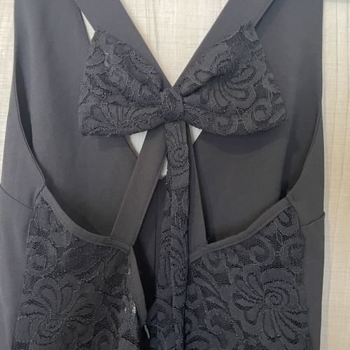 Black playsuit used with lace details and open back, size M