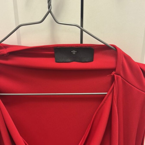 Mini dress with open back by Stelios Koudounaris, like new, red, size M