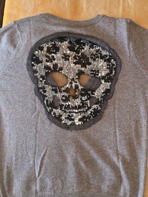 Beige cardigan with skull like new