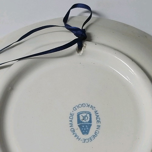 Decorative plate used from Karpathos porcelain with 24k gold detail