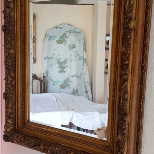 Antique mirror made of wood and plaster