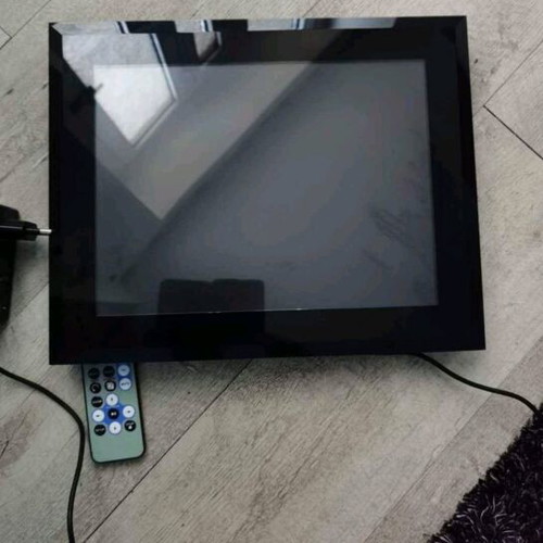 Digital photo and video album used with remote control