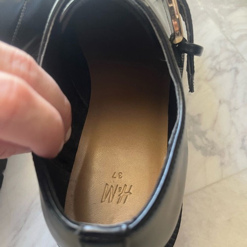 Women’s black H&M mules with high sole and gold buckle, like new, size 37