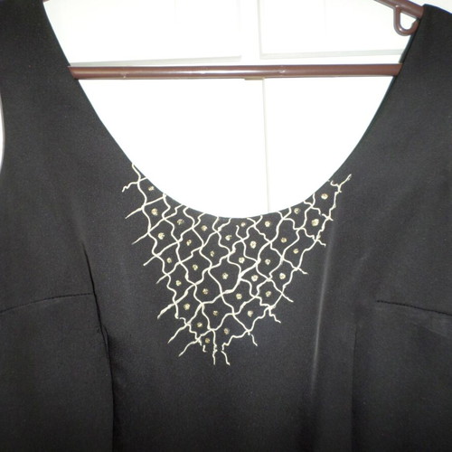 Black dress with gold design size M like new