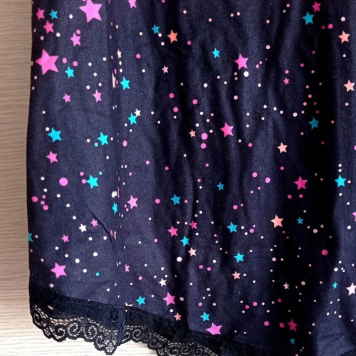 Shein black top with cutout shoulders and star print XL used