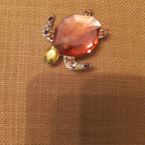 Swarovski turtle brooch new, collectible