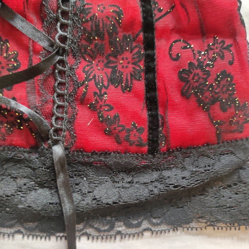 Corset style top red and black, new, size M