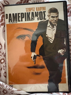 The American DVD like new, action with George Clooney, subtitles