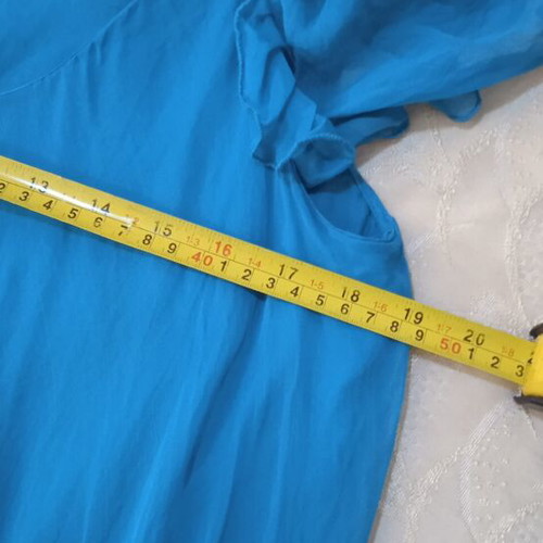 Dress turquoise, like new, medium to large size, airy with puff sleeves