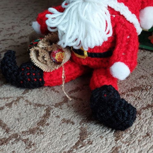 Handmade knitted Santa Claus with candy sack new