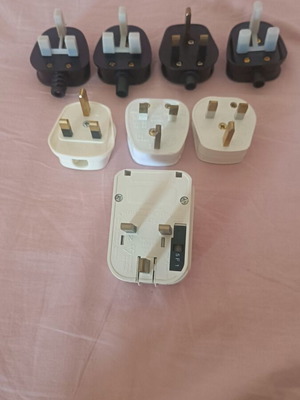 Type G plug power adapters like new, pack of 9 pieces